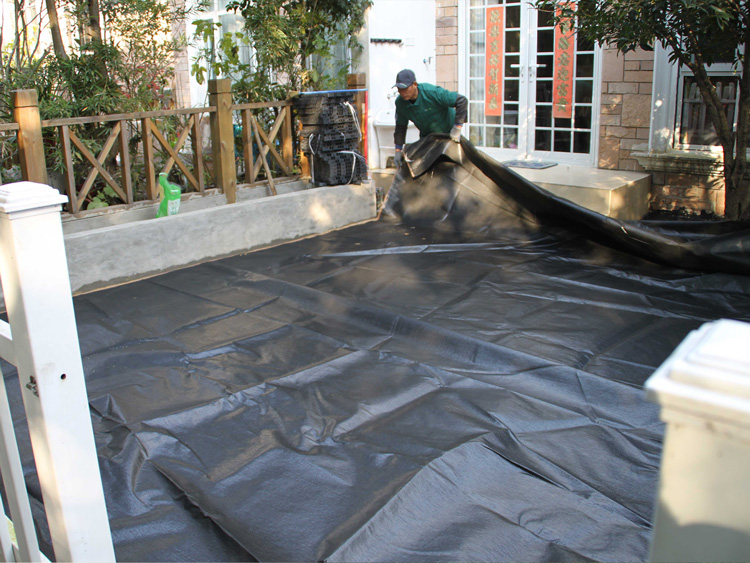 CCGrass, artificial turf installation, laying a geotextile membrane